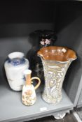 A Doulton Burslem textured vase with handle, having floral decoration, AF, a 'Formalities' by Baum