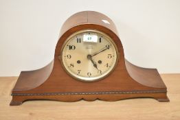 A 1930s Napolean hat mantel clock, having beaded detail to base,'S Tree 121 Gt Dover Street London,