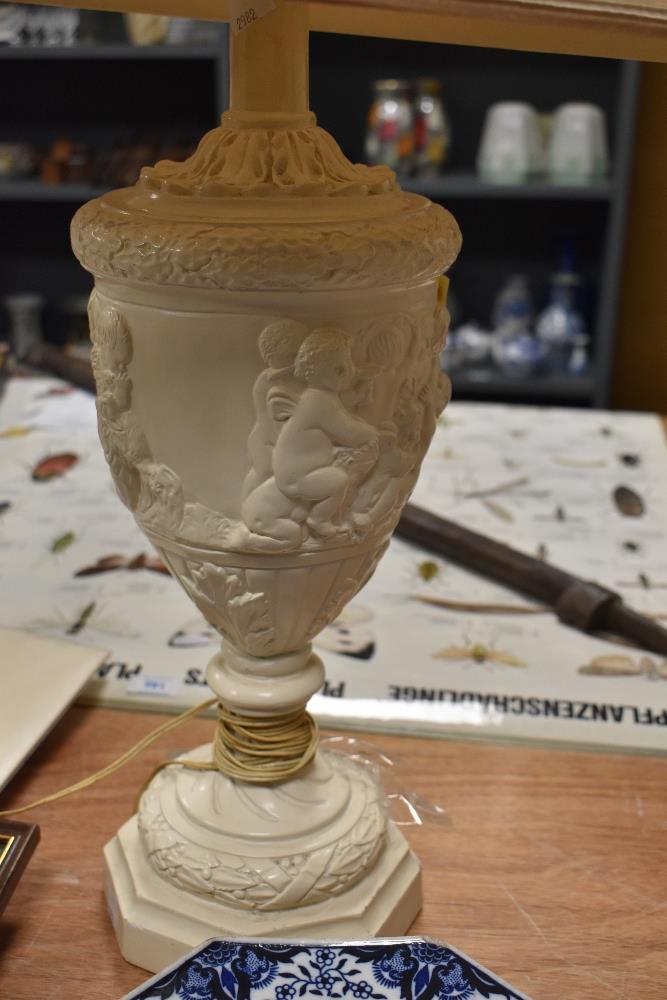 A 20th Century resin urn form table lamp decorated with a classical design, with shade, measuring - Image 2 of 2