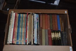 A box of vintage children's annuals, including Charlie Brown's 'Cyclopedia, Blue Peter, and