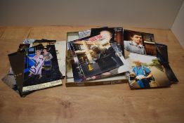 A collection of autographed photographs and ephemera, including Joe Pasquale, Roy Chubby Brown,