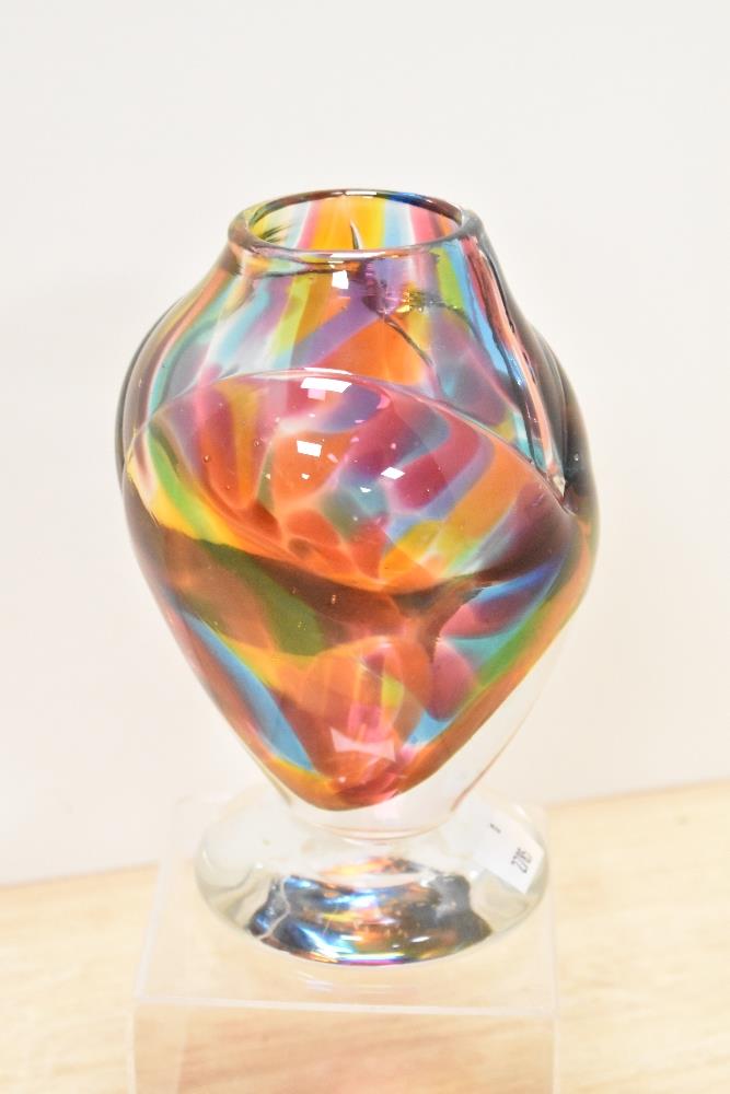 A heavy multi coloured mottled art glass vase, sat on clear glass foot. - Image 2 of 5