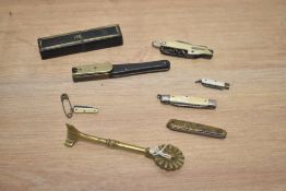 A selection of vintage pen knives, including one with bone handle, cork screw and an antique