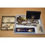 A hallmarked silver babies rattle with whistle, having impressed bird and flower decoration and