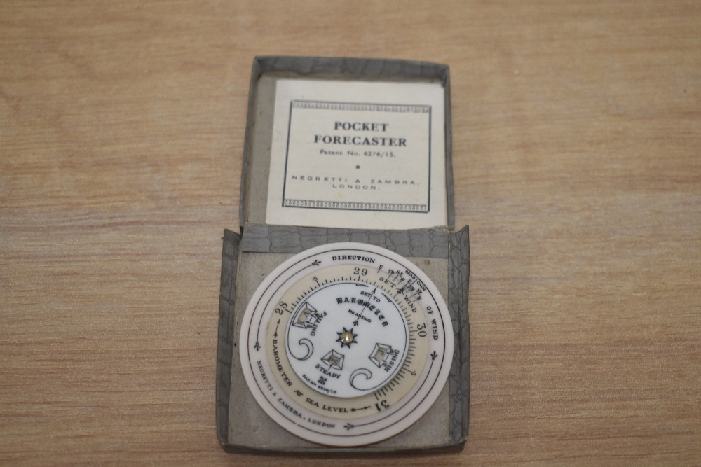 An early 20th century Negretti and Zambra pocket forecaster, in box with instructions.