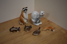 A group of six USSR Russian Lomonosov porcelain animal figures, comprising racoon, ermine, two