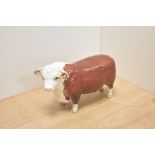 A Beswick Pottery Hereford Bull study, model number 1363A, first version with horns extending past