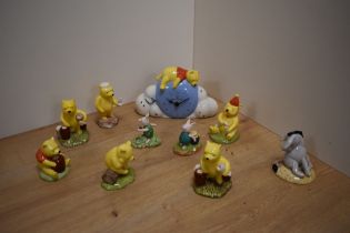 A group of ten Royal Doulton bone china 'Winnie the Pooh Collection' figures, comprising 'How