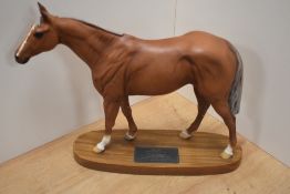 A Beswick pottery racehorse study 'Grundy' style 1 number 2558, racehorse of the year 1975,