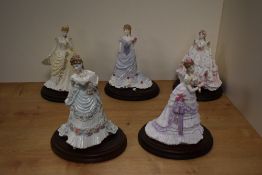 A group of five Royal Worcester fine bone china figurines, comprising; 'Royal Debut' CW159 5704/