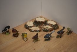 A Beswick Pottery five division tree stump display stand 31cm sold along with seven Beswick