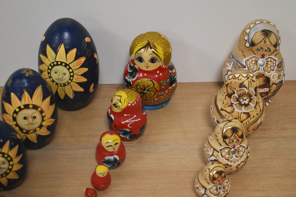 A group of six Russian hand-decorated Matryoshka dolls, of traditional form, one with white jewelled - Image 3 of 3