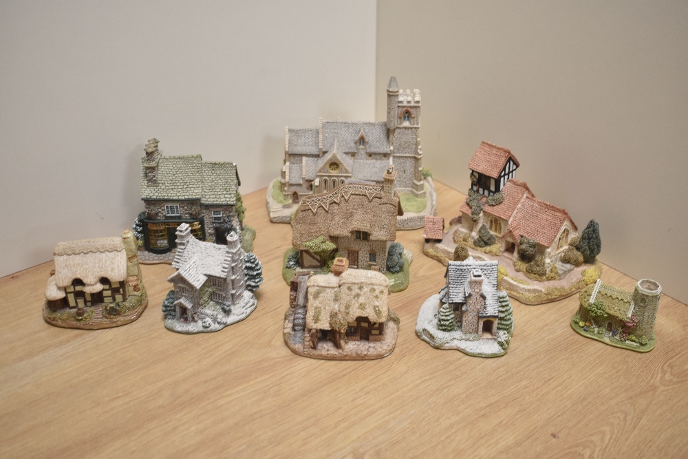 A group of nine Lilliput Lane model cottages, all pre 2000, to include St Marks, The Toy Shop,