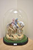 A Continental/German bisque porcelain figure group, depicting a father, his children and horse
