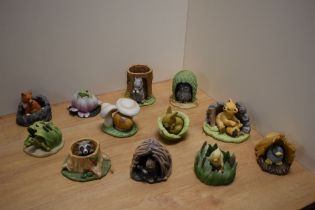 A group of twelve 1980's Franklin Porcelain 'Woodland Suprises' hand-painted bisque animal