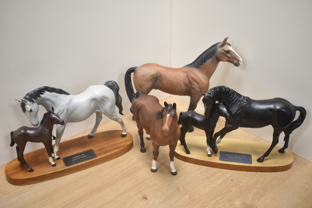 A Beswick Pottery ' Black beauty and foal' model 2536, designed by Graham Tongue' in matte black
