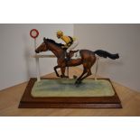A limited edition Border Fine Arts horse racing study, 'The Finish' L52, depicting race horse and