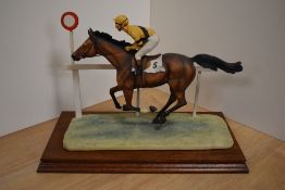 A limited edition Border Fine Arts horse racing study, 'The Finish' L52, depicting race horse and