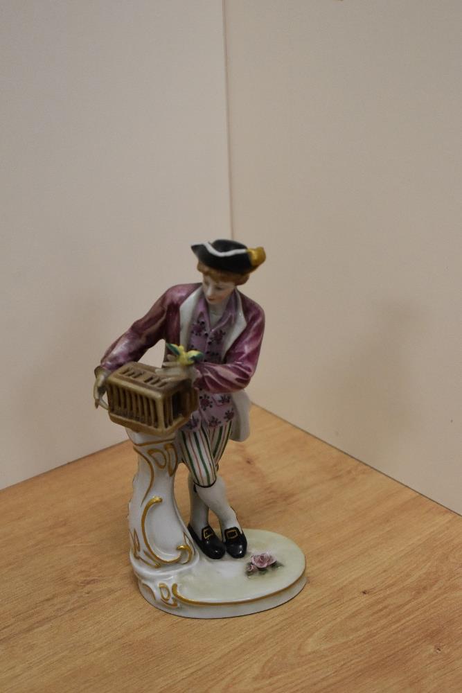 A Continental porcelain figure of 18th century design in the manner of Meissen, modelled as a
