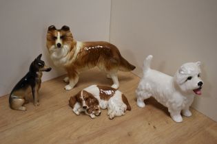 A Royal Doulton bone china dog group, Cocker Spaniel and pup, 14cm sold along with a Sylvac