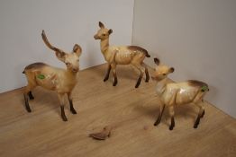 A pair of Beswick Pottery doe's model number 999A, designed by Arthur Gredington, in light brown