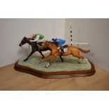 A limited edition Border Fine Arts horse racing group 'The Final Furlong' number 23/950, depicting