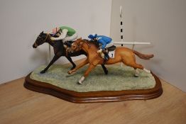 A limited edition Border Fine Arts horse racing group 'The Final Furlong' number 23/950, depicting