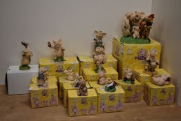 A collection of fifteen 'Piggin' Collectible World Studies comical anthropomorphic pig figures, by