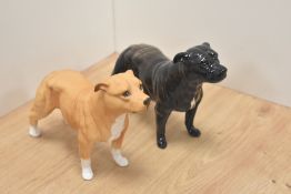Two Royal Doulton bone china Staffordshire Bull terriers, most likely designed by Alan Maslankowski,