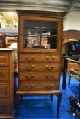 An Edwardian mahogany display cabinet having four drawers on cabriole stand, approx dimensions