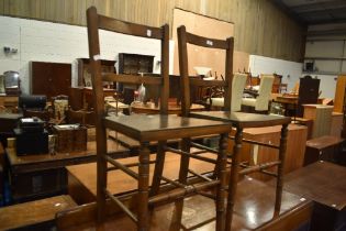 A pair of Victorian bedroom chairs having later plywood seats