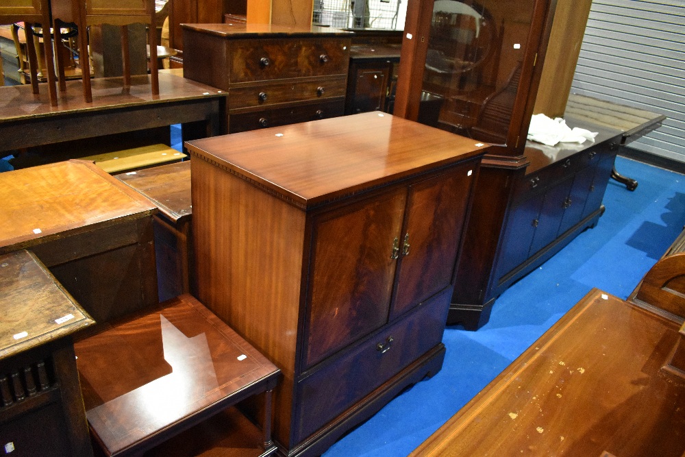 A selection of reproduction Regency style living room furniture comprising wall unit, sideboard