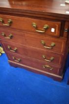 A reproduction chest/desk having fold out top over four drawers, dimensions approx. W64cm D41cm