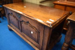 A Titchmarsh and Goodwin oak TV cabinet, modelled as a kist, dimensions approx. W81 H46 D43cm