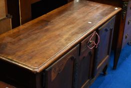 A 19th Century and later French cherry wood sideboard or dresser base of small proportions, approx