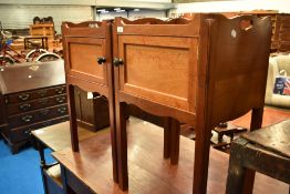 A pair of Georgian style mahogany night stands