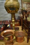 A selection of brass and copperware