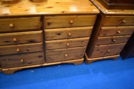 A vintage yellow pine chest of four by four drawers, approx 114 x 89 x 46cm