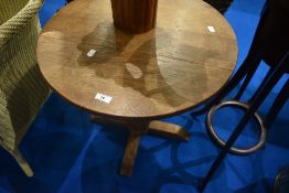 An early to mid 20th Century oak occasional table having circular top , diameter approx. 56cm,