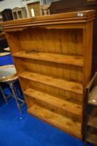 A stained pine bookshelf, approx. H150 W101 D22cm