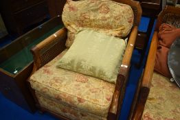 An early 20th Century stained frame and bergere cane three piece suite (af)