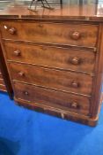 A Victorian mahogany chest of four long drawers, approx dimensions W107, H112, D50cm, some veneer