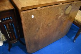 An early 20th Century Arts and Crafts style heavy gateleg dining table