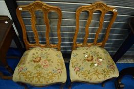 A pair of Continental style stained frame dining chairs
