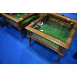 A pair of Edwardian mahogany low bijouterie tables