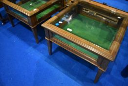 A pair of Edwardian mahogany low bijouterie tables