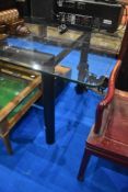 A modern glass dining table approx 210 x 100cm