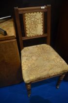 A Victorian mahogany dining chair with later upholstery