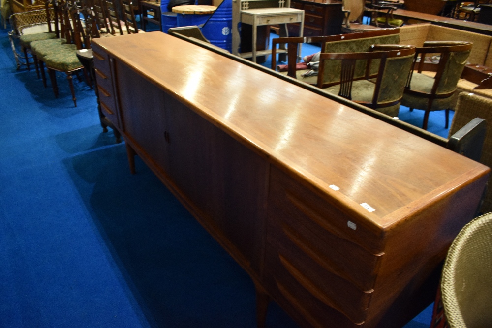 A beautiful 1960s teak sideboard by designer Johannes Andersen (Uldem Modelfabrik), dimensions