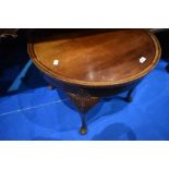 An early 20th Century mahogany occasional table having circular top, diameter approx. 61cm, height